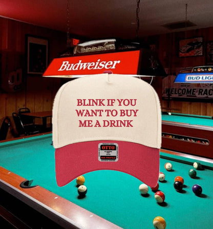 Blink if you want to buy me a drink hat
