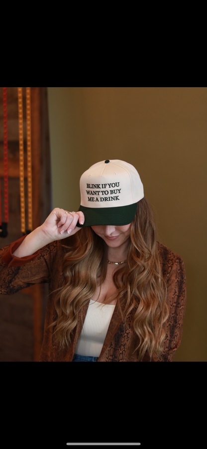 Blink if you want to buy me a drink hat