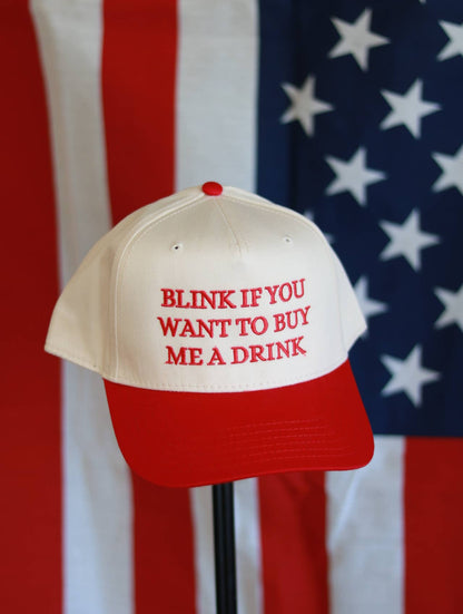 Blink if you want to buy me a drink hat