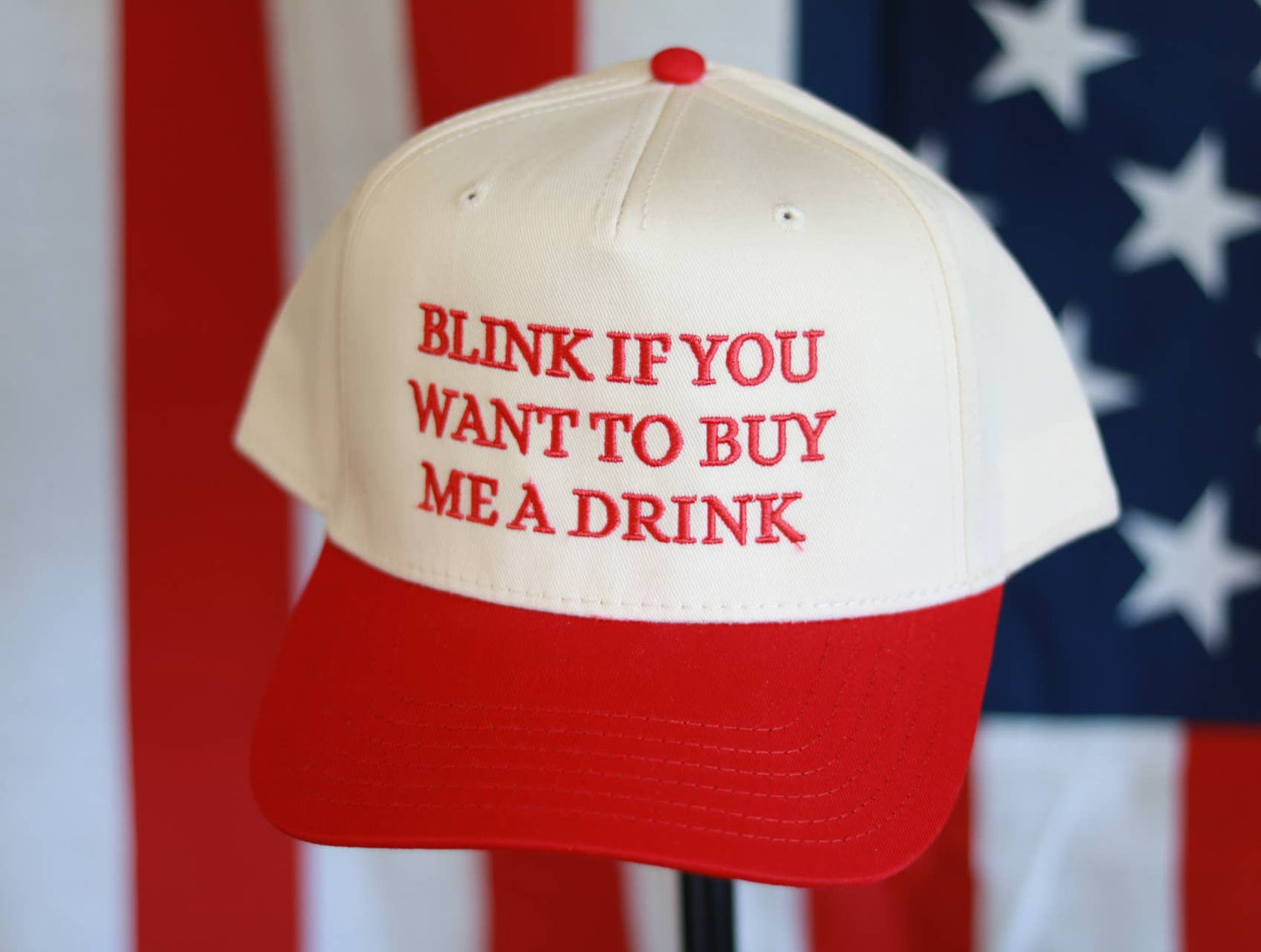 Blink if you want to buy me a drink hat