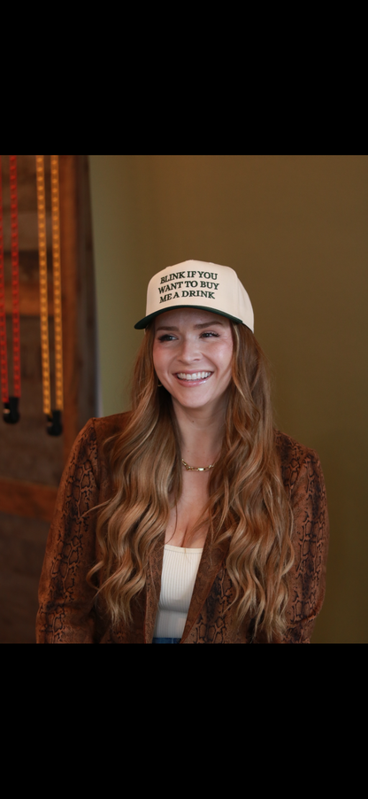 Blink if you want to buy me a drink hat