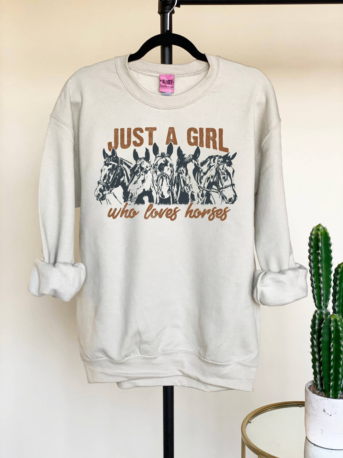 JUST A GIRL WHO LOVES HORSES SWEATSHIRT
