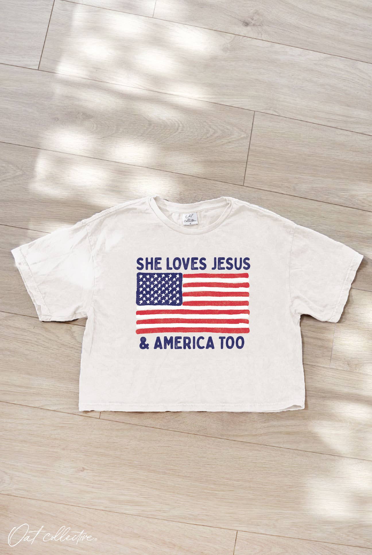SHE LOVES JESUS AND AMERICA TOO Cropped Mineral Graphic Top