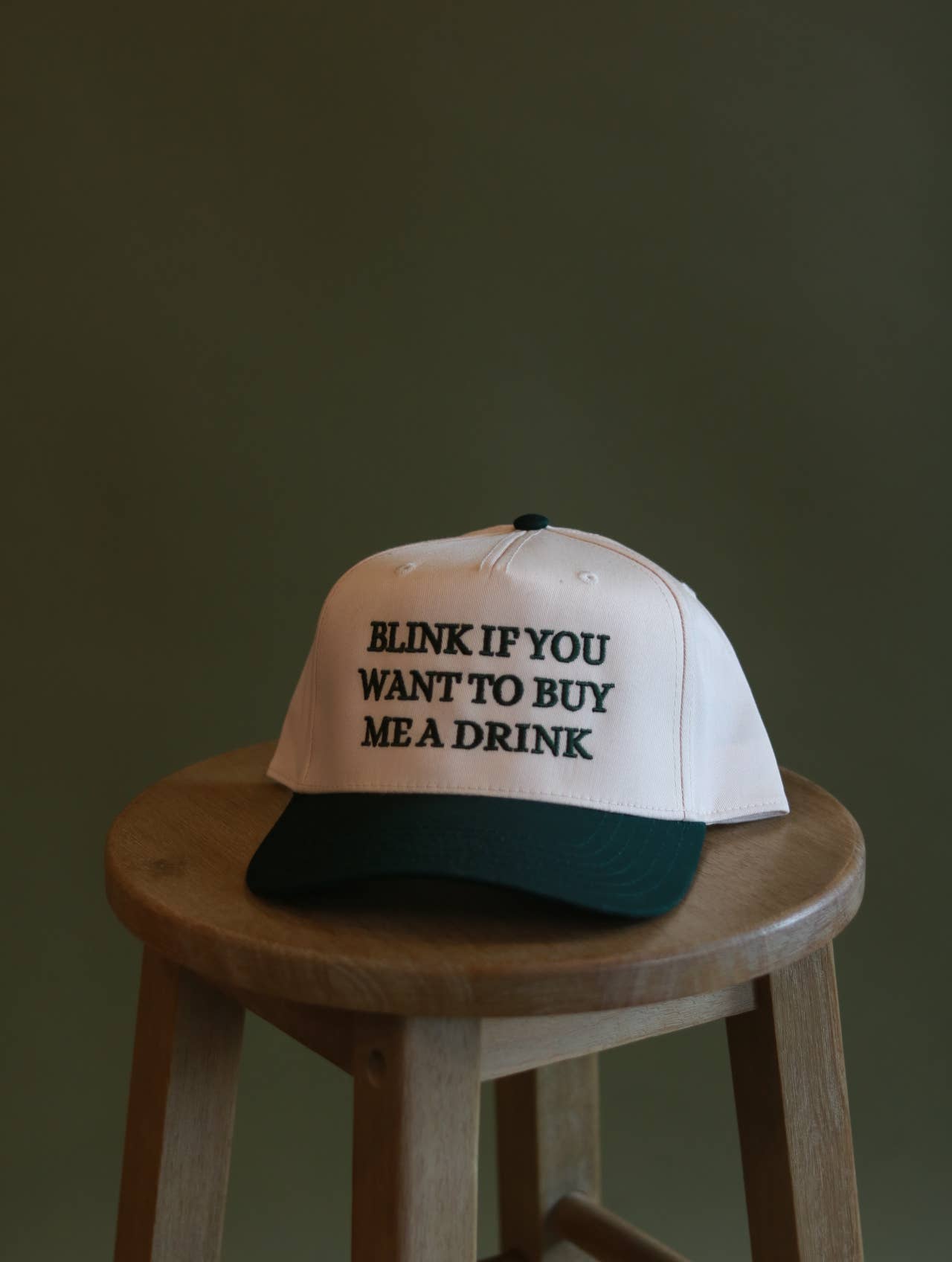 Blink if you want to buy me a drink hat