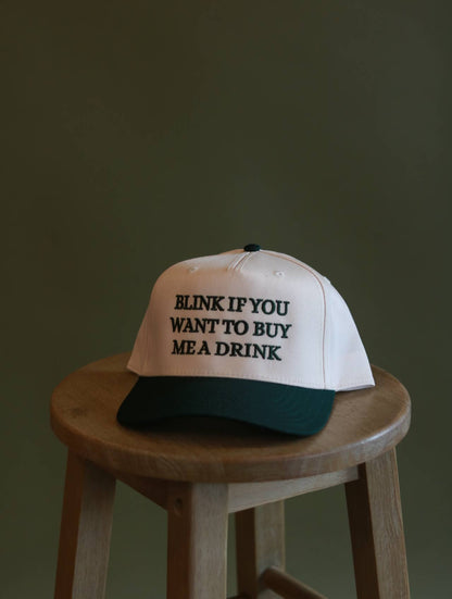 Blink if you want to buy me a drink hat
