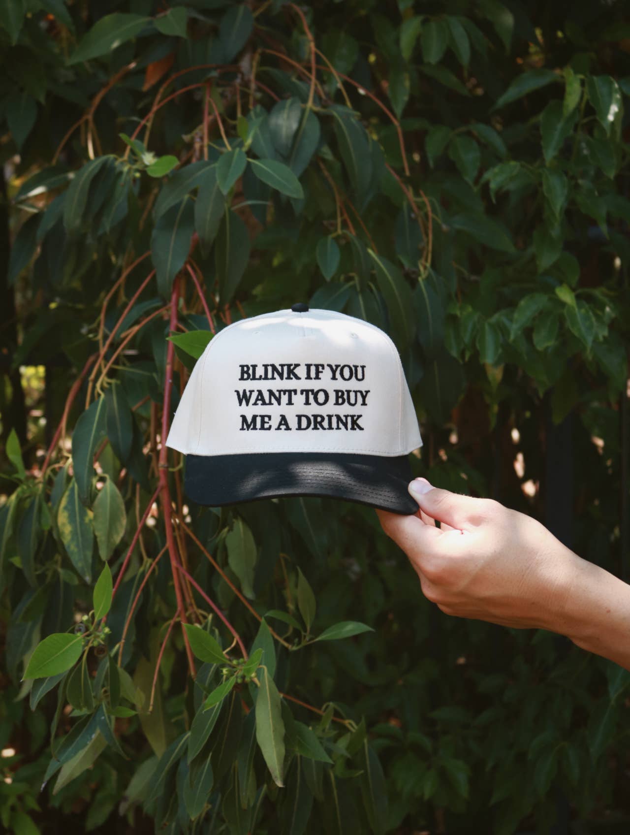 Blink if you want to buy me a drink hat